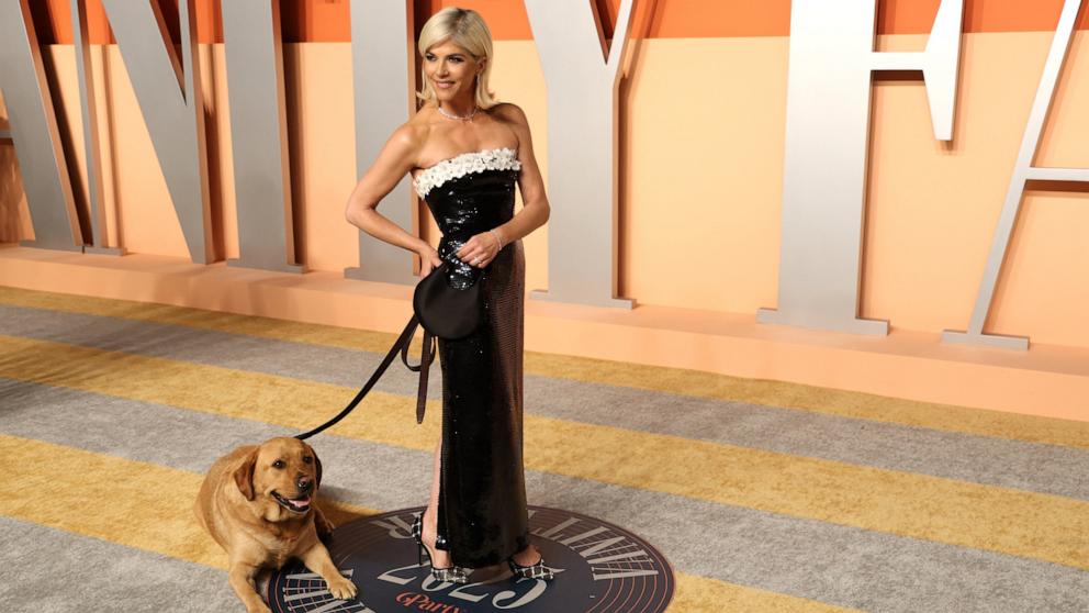 PHOTO: Selma Blair and her service dog Scout arrive at the Vanity Fair Oscars party after the 97th Academy Awards, in Beverly Hills, Calif, Mar. 2, 2025. 