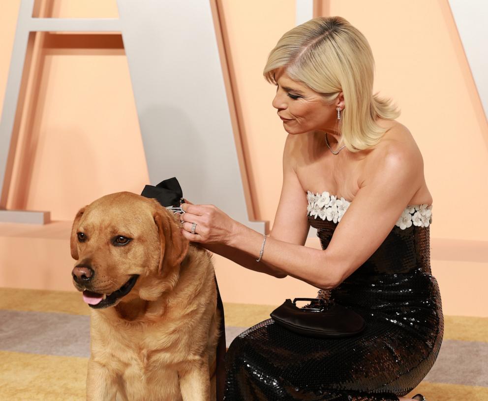 PHOTO: Selma Blair and her service dog Scout arrive at the Vanity Fair Oscars party after the 97th Academy Awards, in Beverly Hills, Calif. Mar. 2, 2025. 