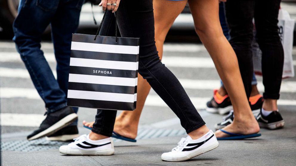 In this Sept. 25, 2019, file photo, a pedestrian carries a Sephora shopping bag while walking along a street in New York.