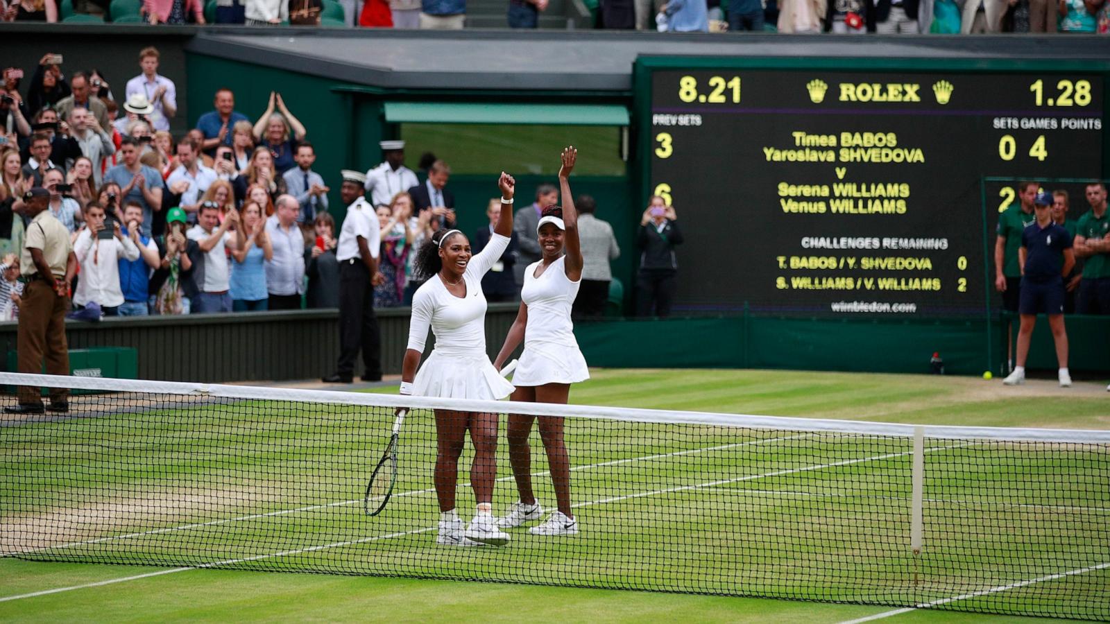 PHOTO: Venus Williams and Serena Williams celebrate victory in the Ladies Doubles Final against Timea Babos and Yaroslava Shvedova at the All England Lawn Tennis and Croquet Club on July 9, 2016 in London, England.