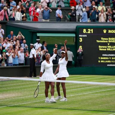 PHOTO: Venus Williams and Serena Williams celebrate victory in the Ladies Doubles Final against Timea Babos and Yaroslava Shvedova at the All England Lawn Tennis and Croquet Club on July 9, 2016 in London, England.