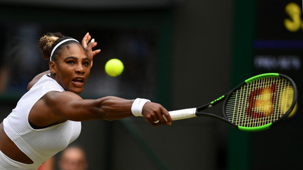 PHOTO: Serena Williams returns against US player Alison Riske during their women's singles quarter-final match on day eight of the 2019 Wimbledon Championships at The All England Lawn Tennis Club in Wimbledon, southwest London, on July 9, 2019.