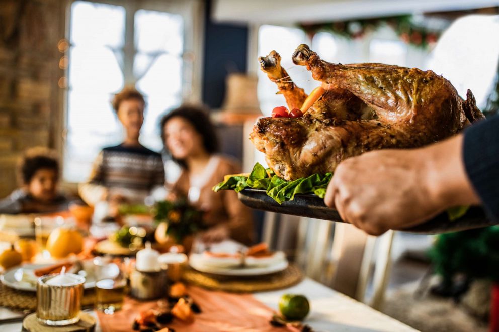 PHOTO: A person prepares to serves a Thanksgiving dinner in this stock photo.