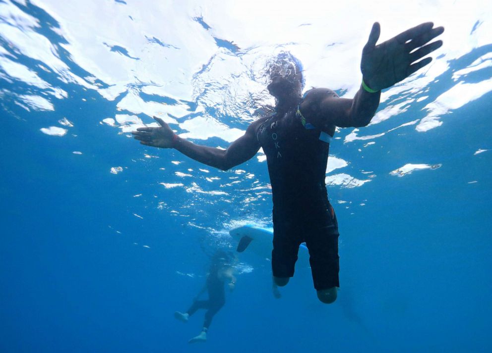 PHOTO: Roderick Sewell participates in the open water swim portion of the 2019 IRONMAN World Championship on Oct. 12, 2019, in Kona, Hawaii. 
