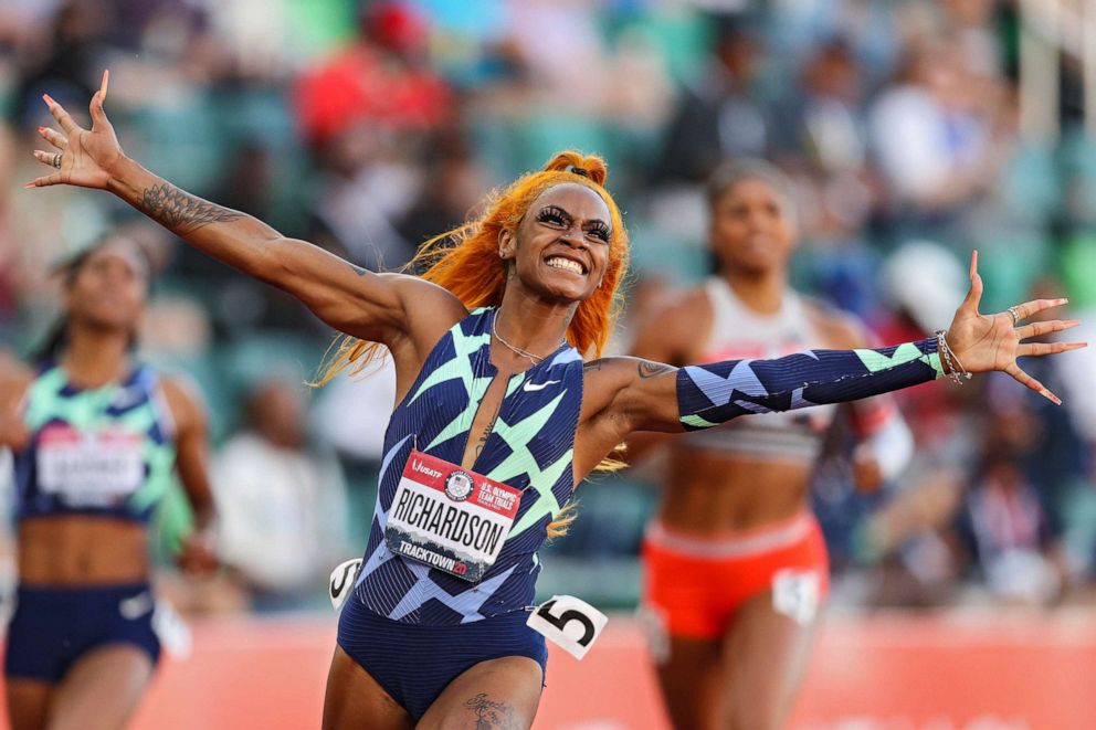 PHOTO: Sha'Carri Richardson celebrates winning the Women's 100 Meter final on day 2 of the 2020 U.S. Olympic Track & Field Team Trials at Hayward Field on June 19, 2021, in Eugene, Ore.