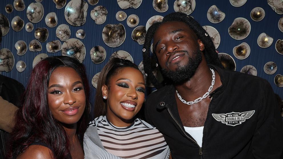 PHOTO: Coco Jones, Victoria Monet and Shaboozey celebrate The GRAMMYs at Fleur Room on Feb. 02, 2025 in Los Angeles.