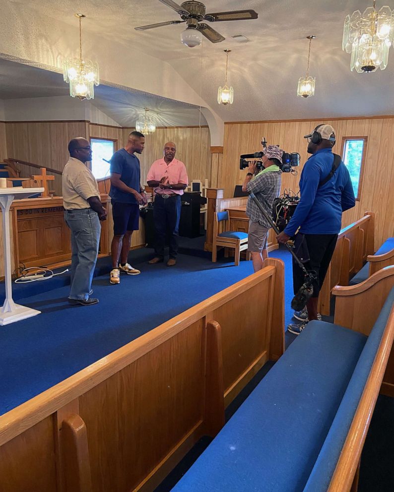 PHOTO: Philip and Billy White show Michael Strahan the CME Methodist Church in Shankleville, Texas, Aug. 3, 2023.