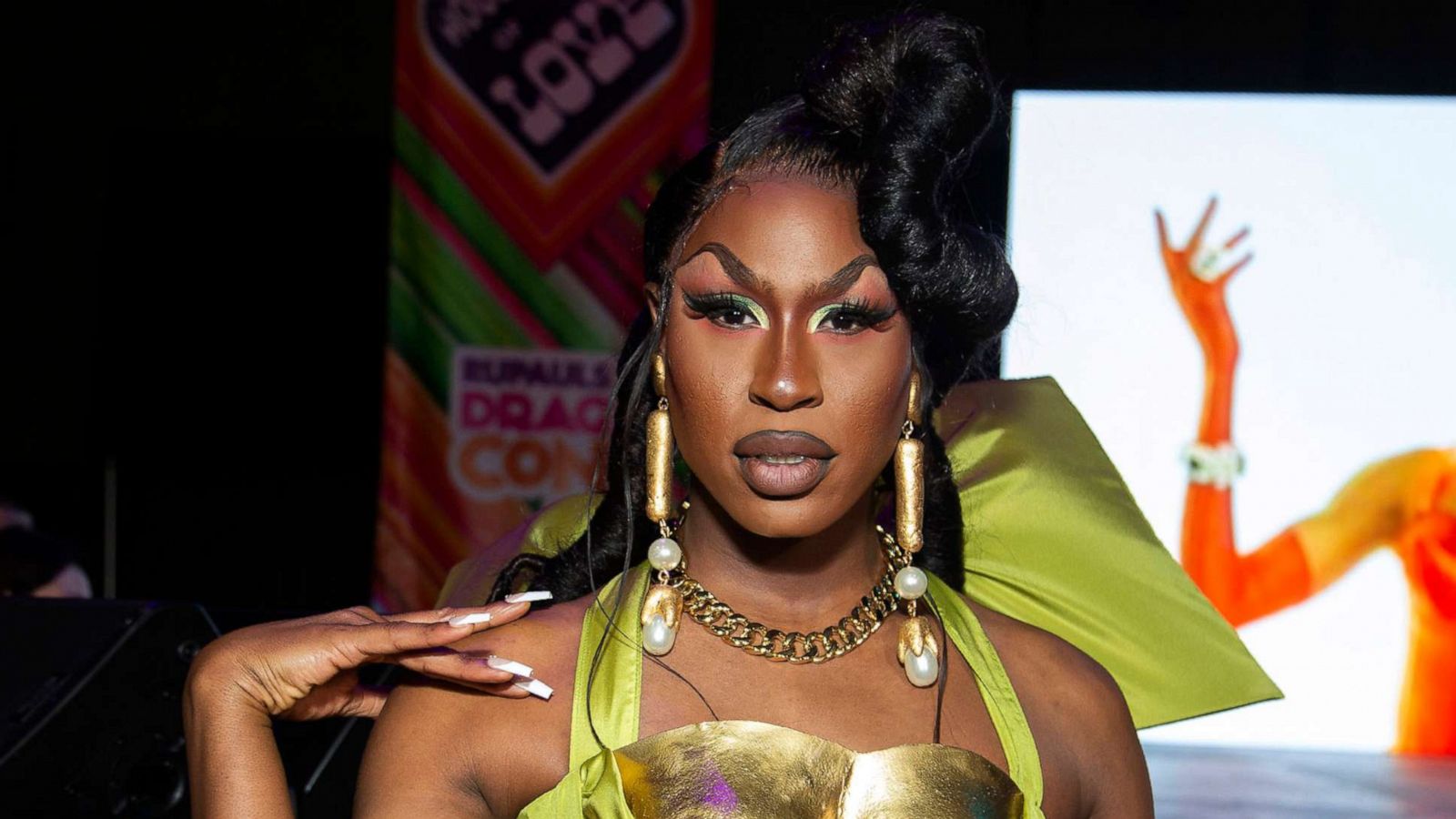 PHOTO: Shea Coulee attends the pink ribbon cutting during RuPaul's Los Angeles DragCon at Los Angeles Convention Center, May 13, 2022, in Los Angeles.