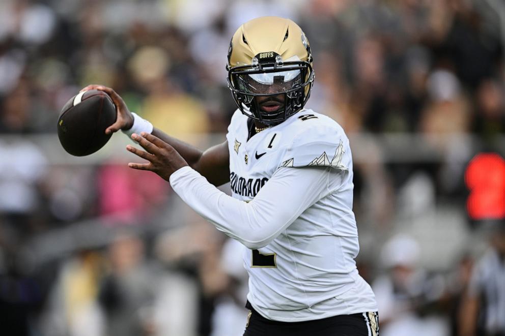 PHOTO: In this Sept. 28, 2024, file photo, Colorado quarterback Shedeur Sanders throws a pass against Central Florida during the first half of an NCAA college football game, in Orlando, Fla.