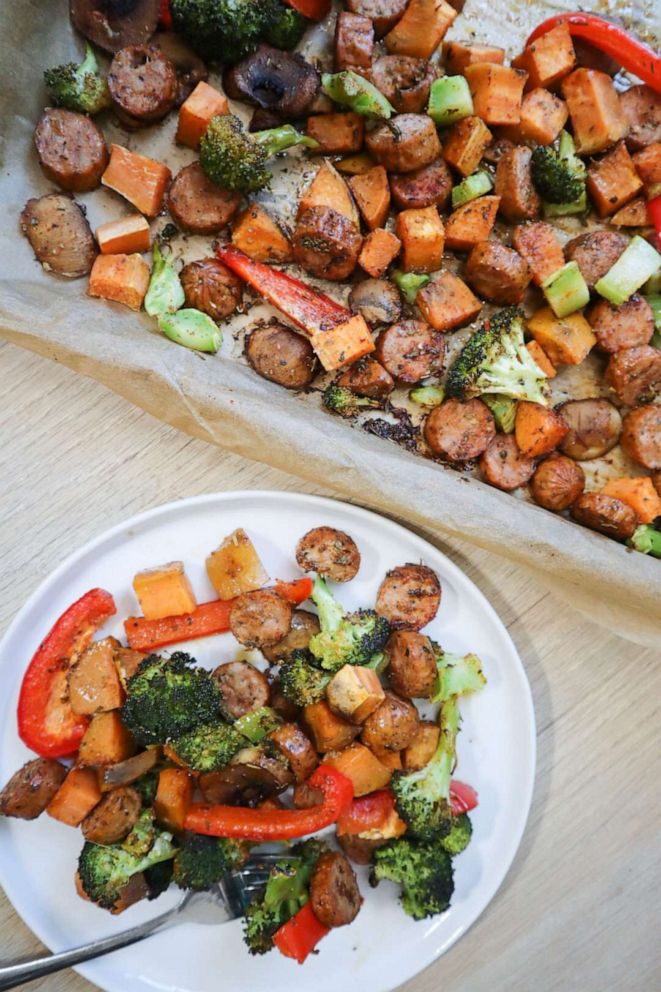 PHOTO: Dinner in a pan with chicken sausages and vegetables.