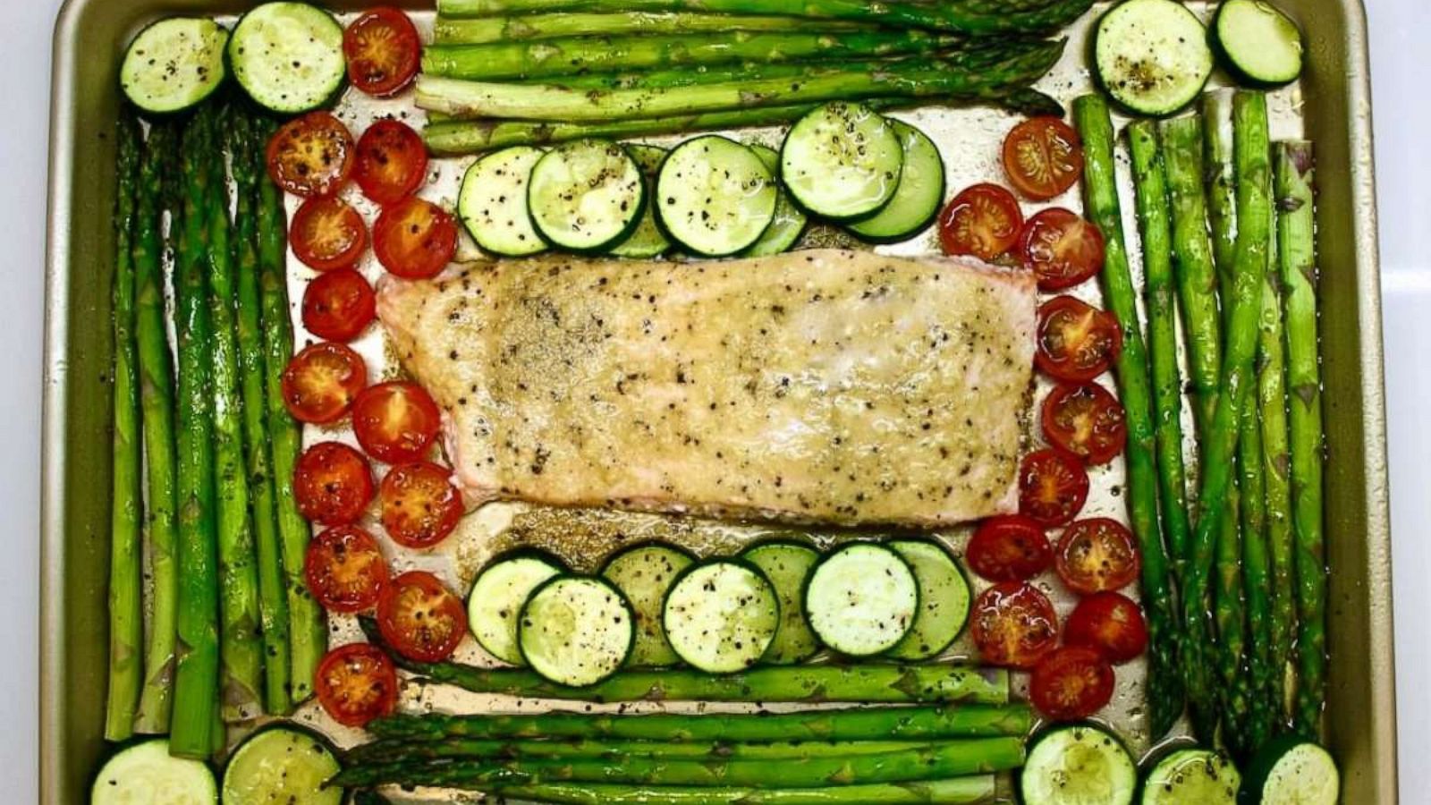 PHOTO: A sheet pan of salmon and vegetables.