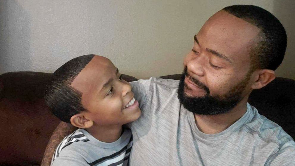 PHOTO: Shyon Clark and his dad, Johnnie Clark, embrace in a hug in this undated family photo.