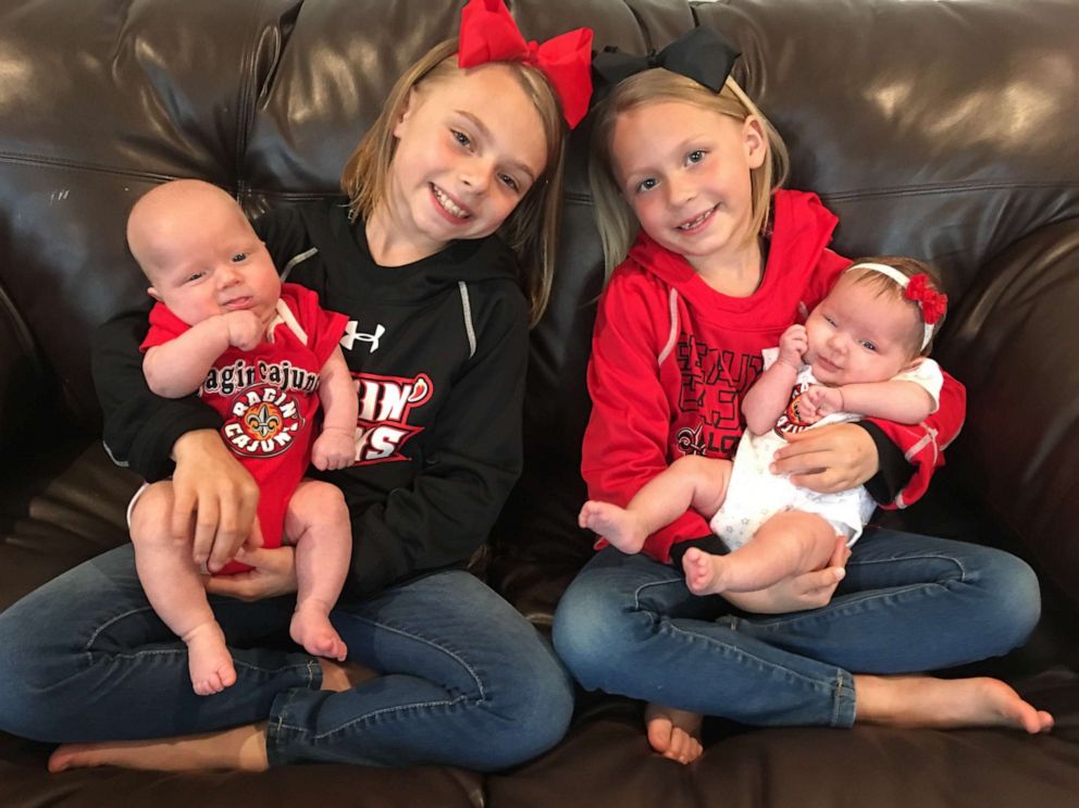 PHOTO: Big sisters Mariah and Aubree hold their twin siblings, Gavin and Grace.
