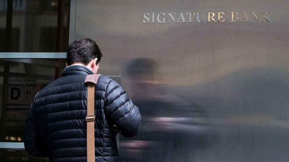 PHOTO: A worker arrives to the Signature Bank headquarters in New York City, March 12, 2023.