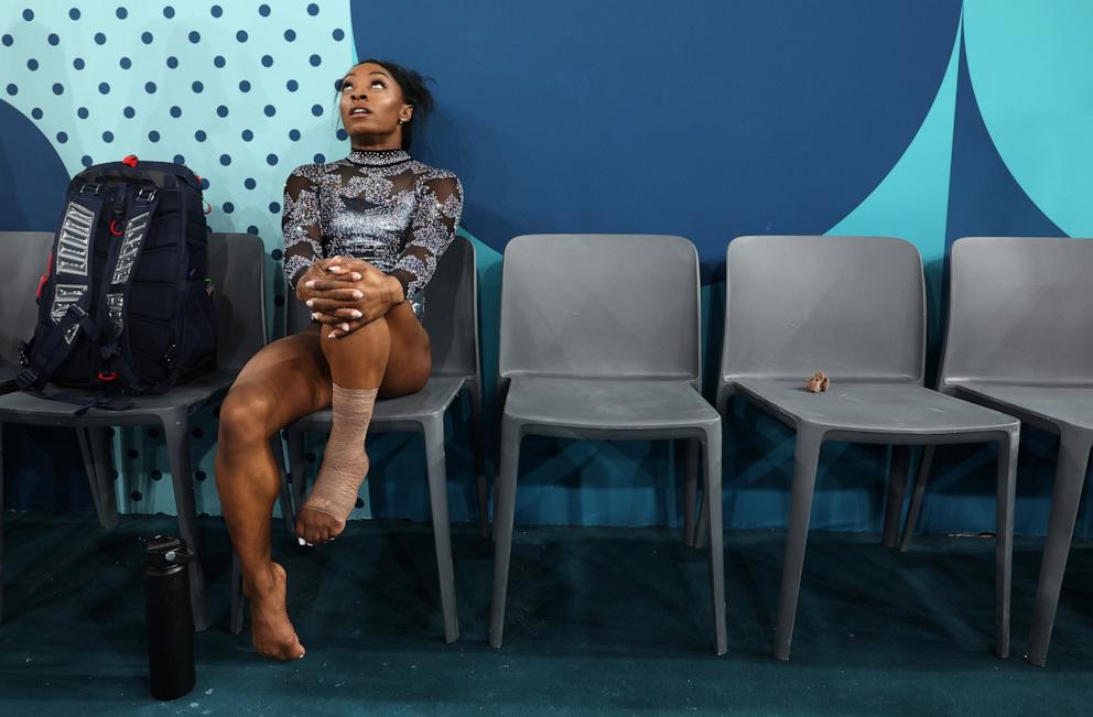 PHOTO: Simone Biles of Team United States looks on from the sidelines during the Artistic Gymnastics Women's Qualification on day two of the Olympic Games Paris 2024 at Bercy Arena on July 28, 2024 in Paris, France.