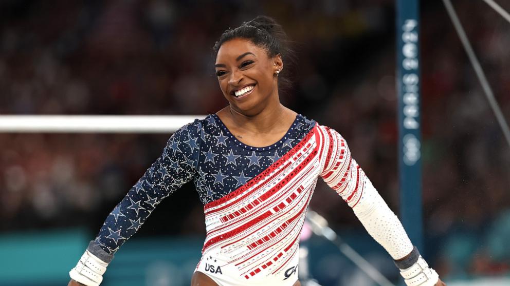 PHOTO: Simone Biles of Team United States reacts after finishing her routine on the uneven bars during the Artistic Gymnastics Women's Team Final on day four of the Olympic Games Paris 2024 at Bercy Arena, July 30, 2024, in Paris.