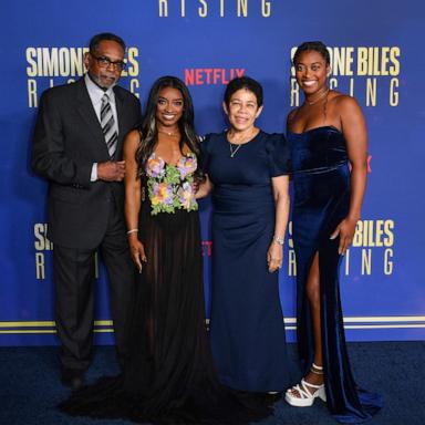 PHOTO: Simone Biles (2nd L), her father Ron Biles (L), mother Nellie Biles (2nd R) and sister Adria Biles arrive for Netflix's "Simone Biles Rising: Part 2" premiere at The Egyptian Theatre Hollywood, Oct. 23, 2024, in Hollywood, Calif. 