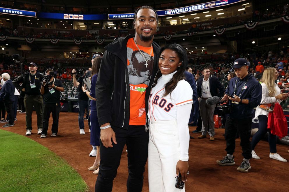 PHOTO: Simone Biles and Houston Texans safety Jonathan Owens are seen prior to Game 1 of the 2022 World Series, Oct. 28, 2022, in Houston.