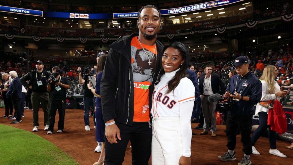 PHOTO: Simone Biles and Houston Texans safety Jonathan Owens attend the 2022 World Series, Oct. 28, 2022, in Houston.