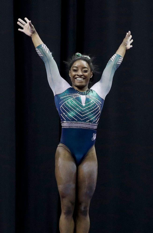 PHOTO: Simone Biles celebrates after competing on the beam at the U.S. Gymnastics Championships on Friday, Aug. 9, 2019, in Kansas City, Mo.