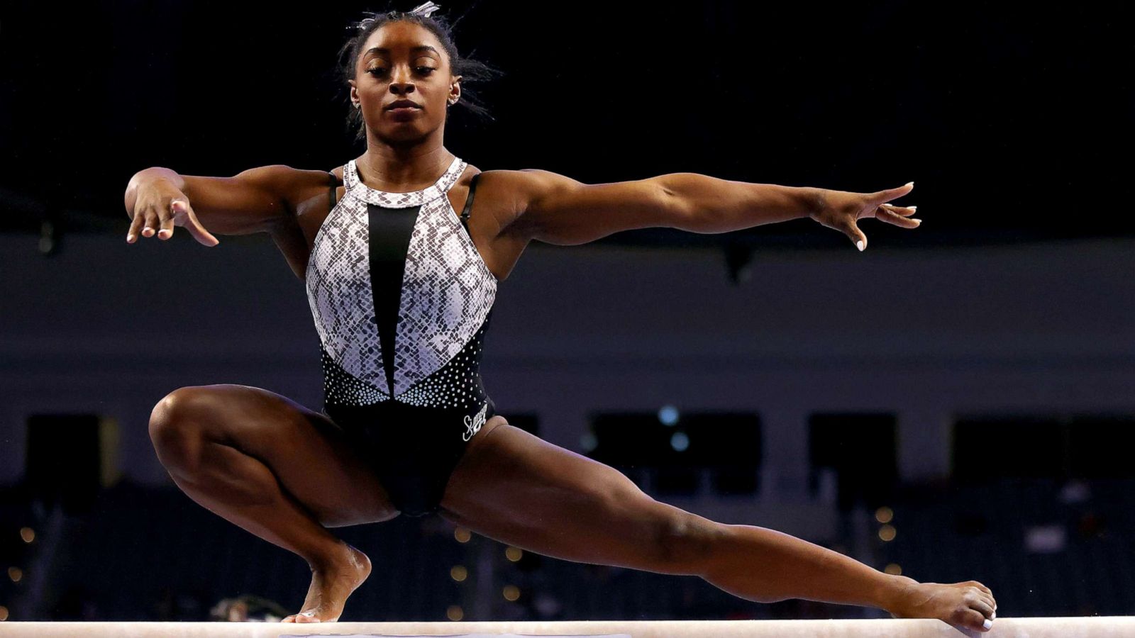 PHOTO: Simone Biles warms up on the beam prior to the Senior Women's competition of the U.S. Gymnastics Championships at Dickies Arena on June 6, 2021 in Fort Worth, Texas.