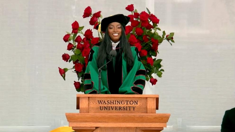 PHOTO: Simone Biles addresses the Washington University class of 2025 during their commencement, May 12, 2025.