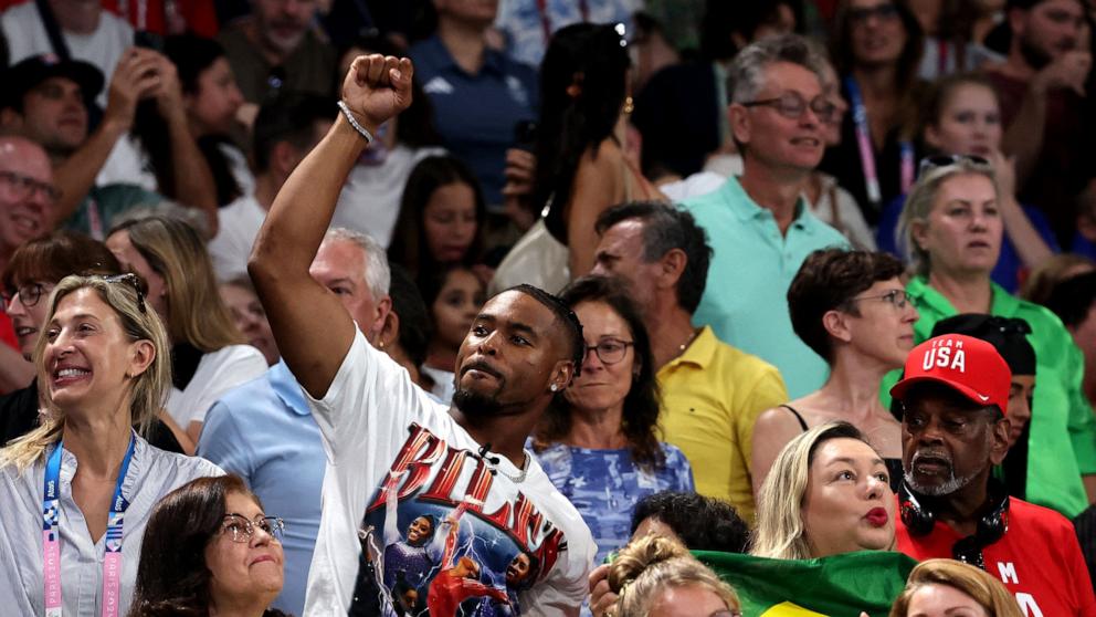 PHOTO: Simone Biles' husband Jonathan Owens cheers in the stands at the Artistic Gymnastics Women's Team Final at the Paris 2024 Olympics, on July 30, 2024, in Paris.