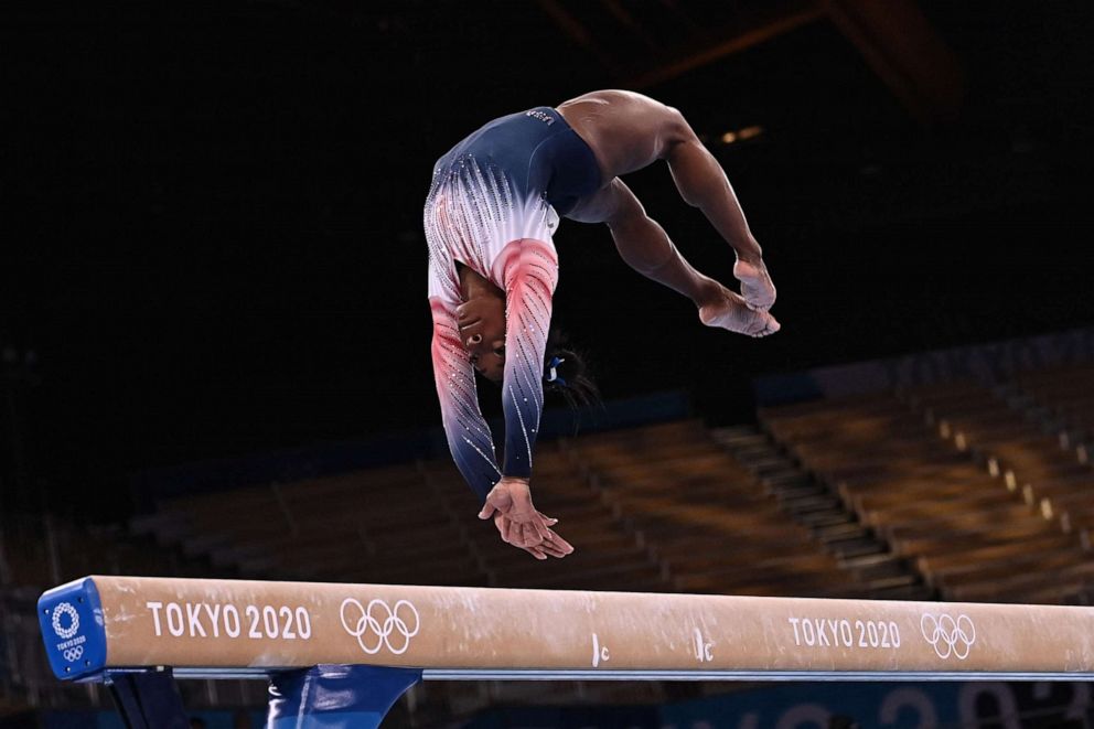 PHOTO: Simone Biles competes in the artistic gymnastics women's balance beam final of the Tokyo 2020 Olympic Games at Ariake Gymnastics Centre in Tokyo, Aug. 3, 2021.