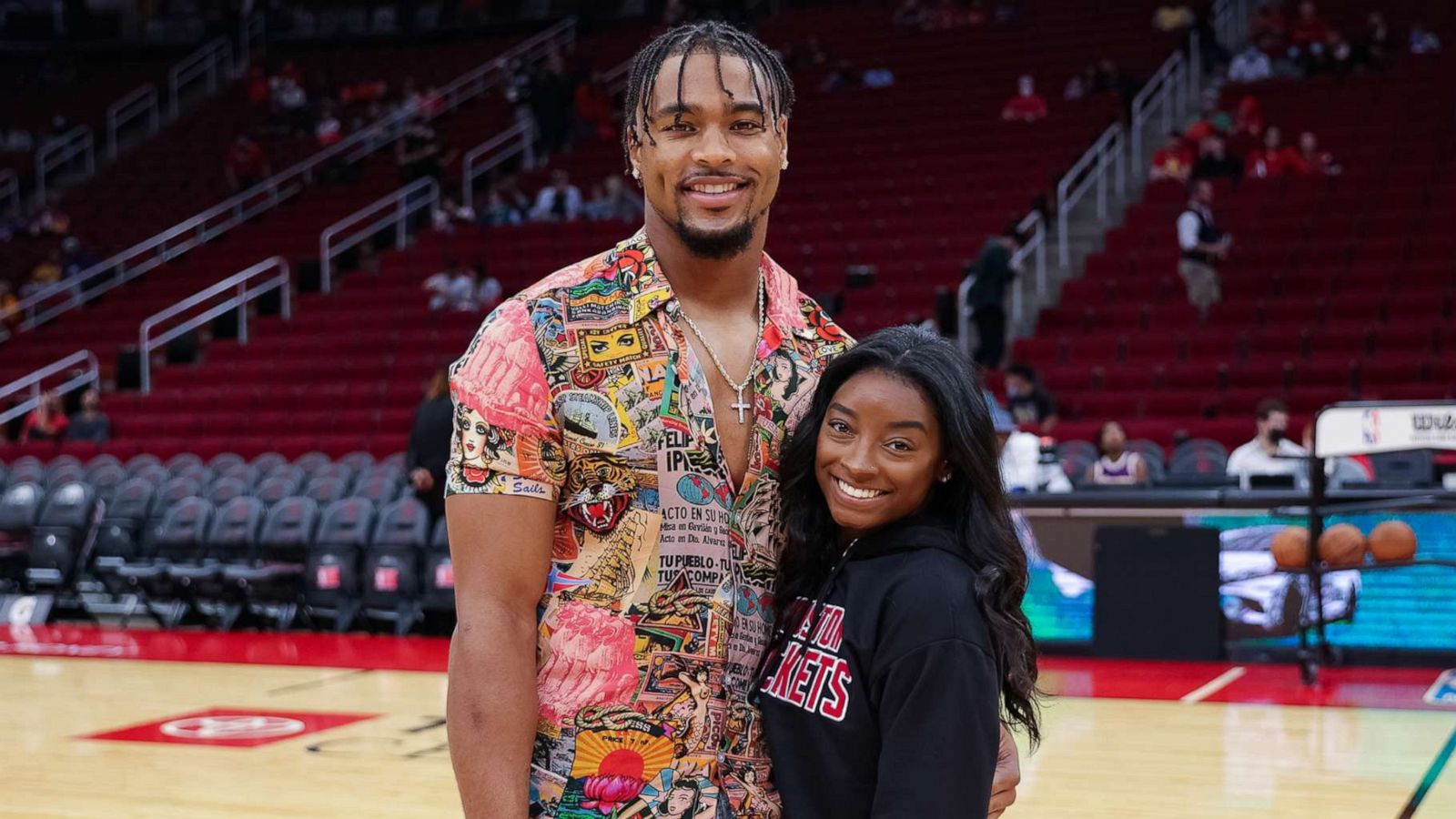 PHOTO:Jonathan Owens and Simone Biles attend a game between the Houston Rockets and the Los Angeles Lakers at Toyota Center on Dec. 28, 2021 in Houston.