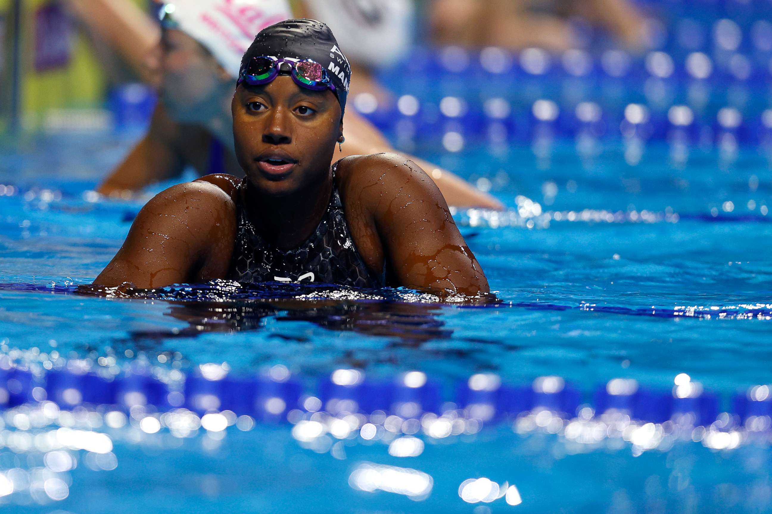 PHOTO: Simone Manuel reacts after competing in a preliminary heat for the Women's 50m freestyle during the 2021 U.S. Olympic team swimming trials at CHI Health Center, June 19, 2021, in Omaha, Nebraska.
