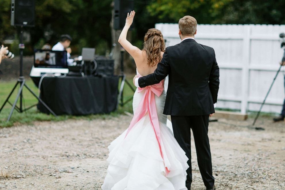 PHOTO: Carrie and John Michael Simpson, a North Carolina couple, wave to Jordan Davis who surprised the couple with their favorite song for their first dance over zoom.