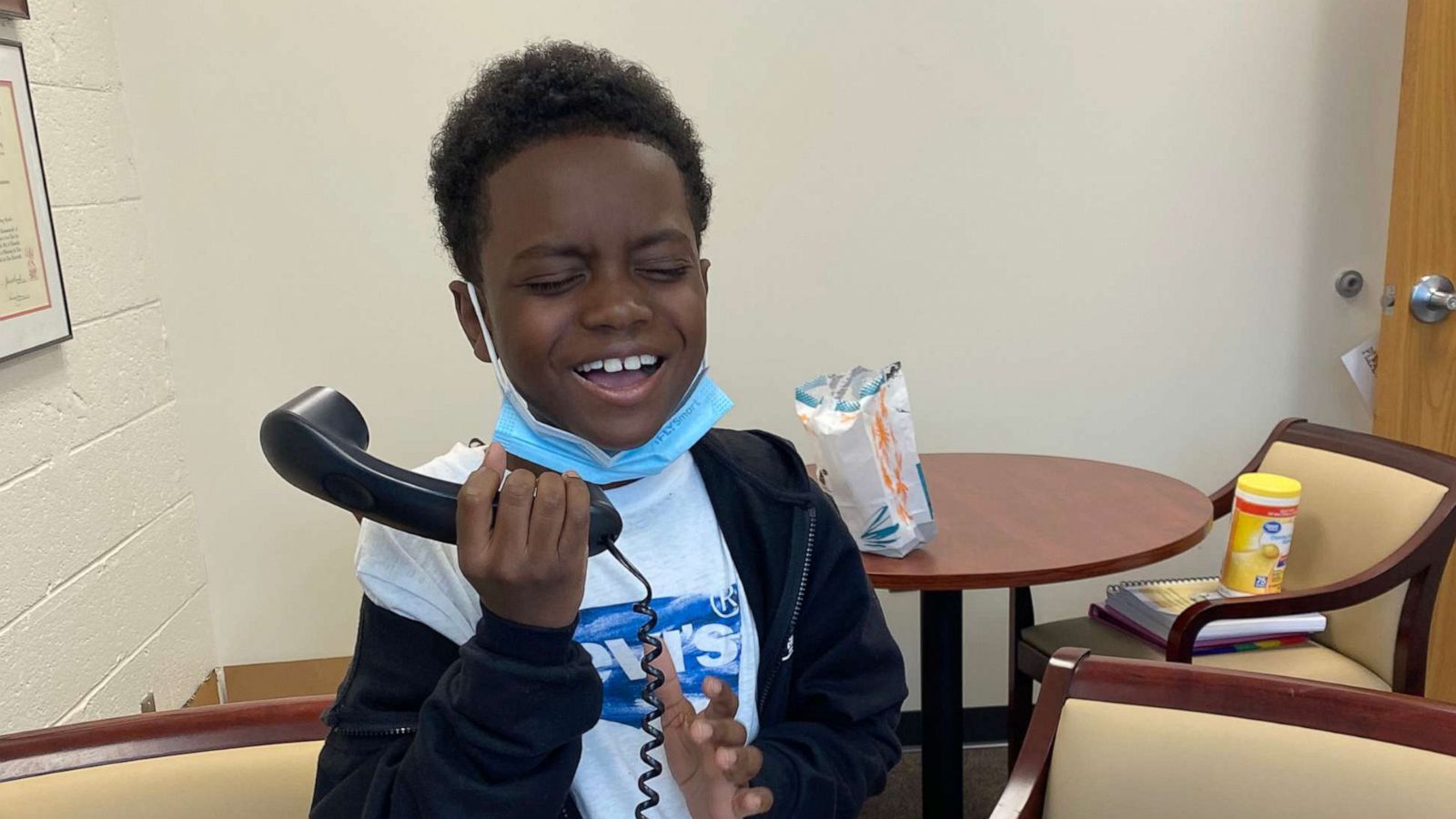 PHOTO: D'Corey Johnson, 9, sings "The Star-Spangled Banner" during Bates Elementary School's morning announcements, April 23, 2021, in Louisville, Ky.