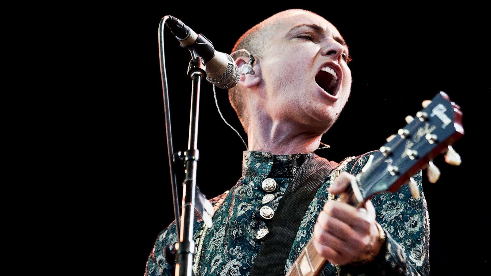 PHOTO: FILE - Irish singer-songwriter SinÃad O'Connor in concert on the first night of the Toender Folk Music Festival in Toender, on the south western part of Denmark, Aug. 23, 2013.