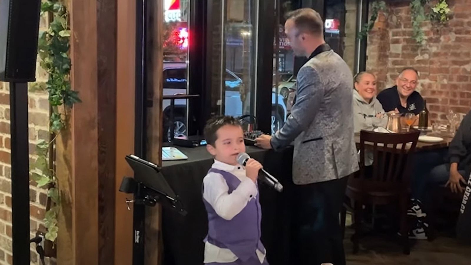 PHOTO: 7-year-old Marcello gave a rousing rendition of "Beyond the Sea" at his parents' wedding anniversary celebration.