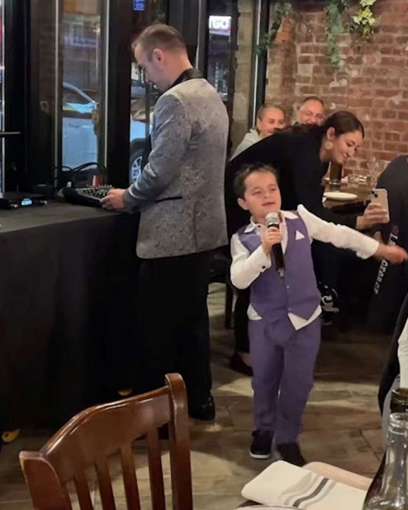 PHOTO: 7-year-old Marcello gave a rousing rendition of "Beyond the Sea" at his parents' wedding anniversary celebration.