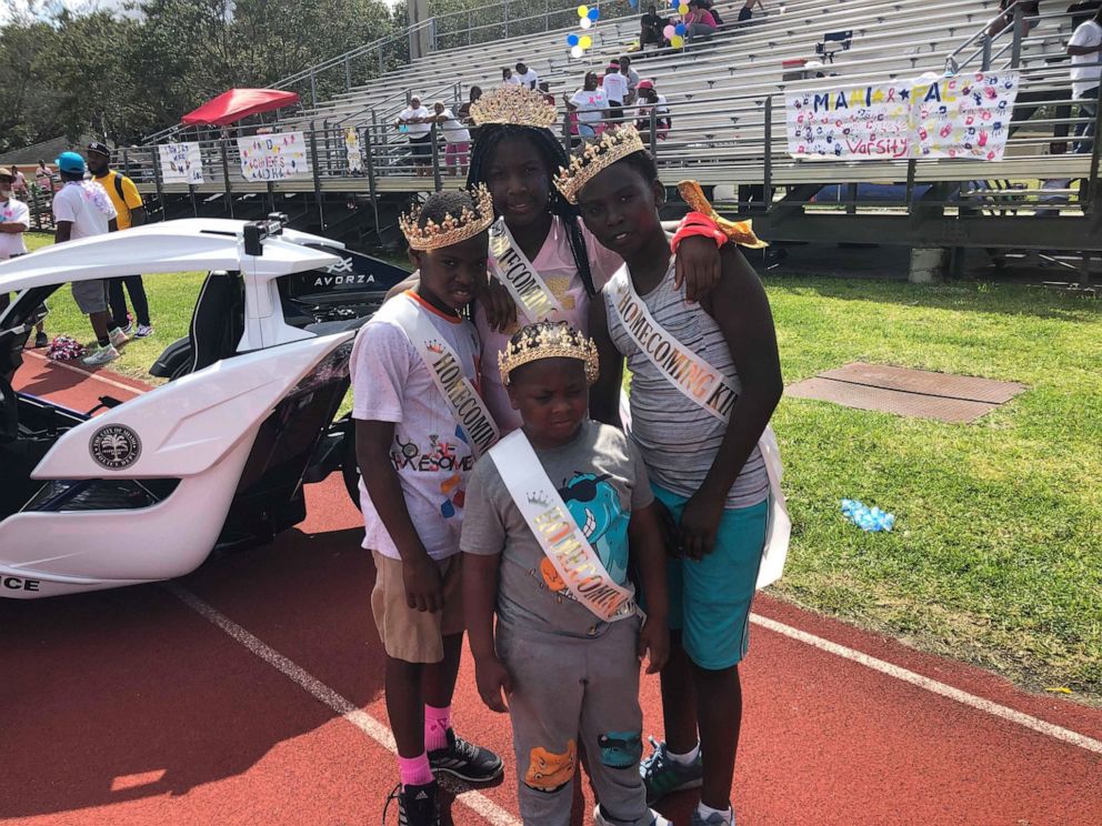 PHOTO: Sherina Akins of Miami officially adopted Christyana, 10, and Isaiah, 1, at Miami Dade Children Juvenile Courthouse. The kids join Akins' other three children, Tharon, 12, Terrence, 11, and Bronchea, 5.