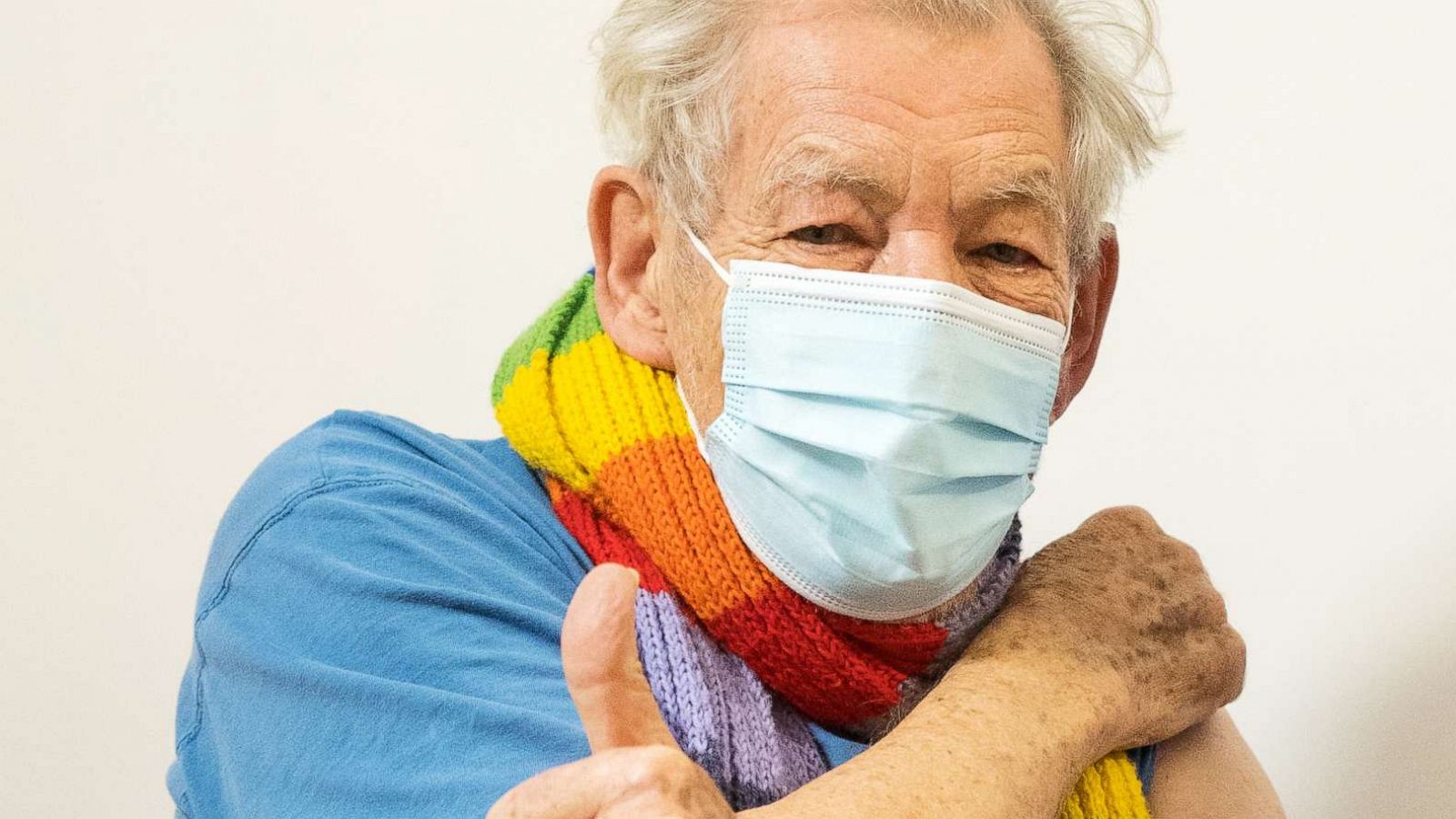 PHOTO: Sir Ian McKellen looks on as he receives the Pfizer-BioNTech COVID-19 vaccine from GP Dr Phil Bennett-Richards in London, Dec. 16, 2020.