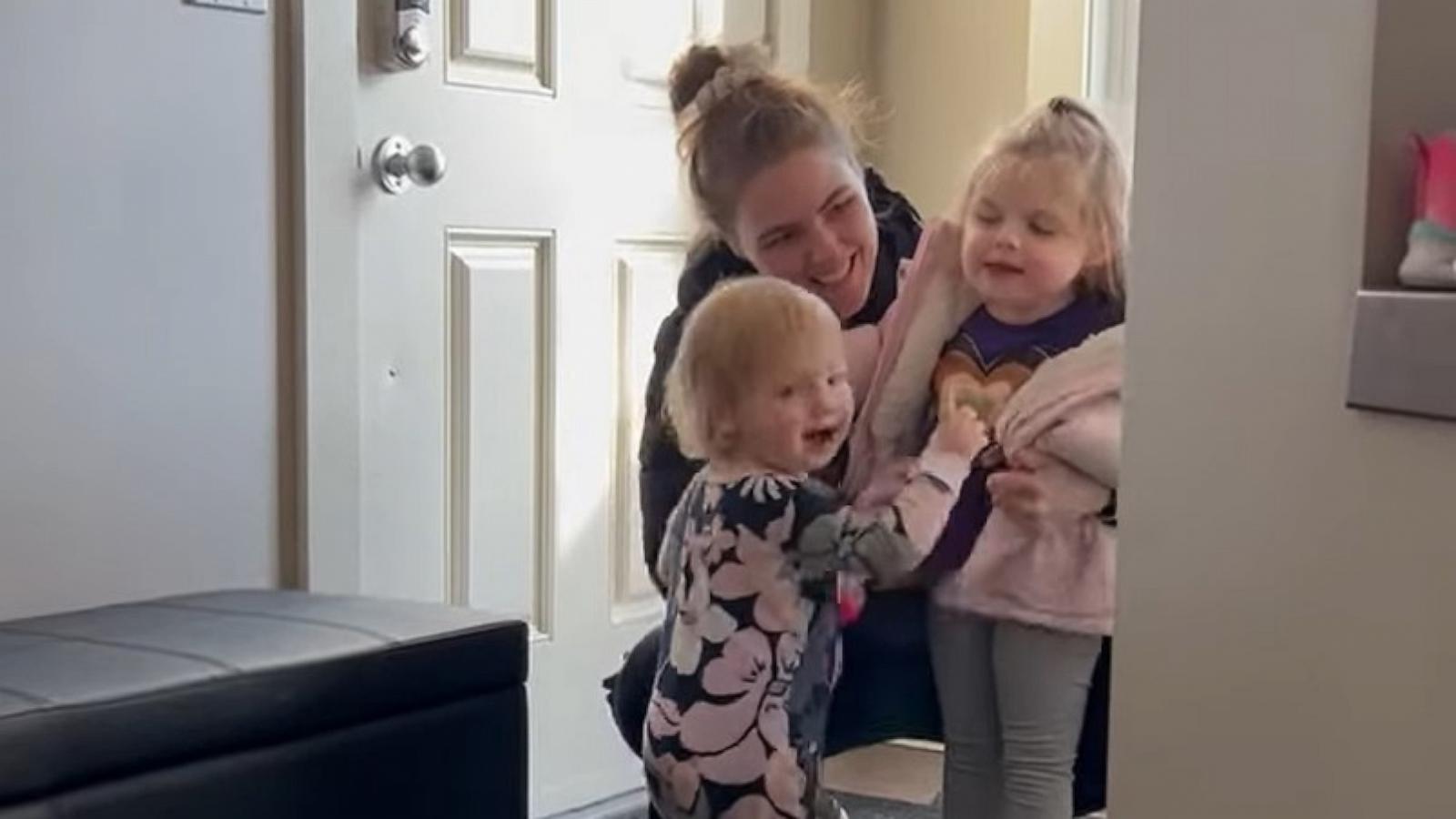 PHOTO: A toddler was thrilled when her big sister, who has a rare neurodegenerative disease, returned home after preschool in Calgary, Alberta, on Feb. 26, 2024.