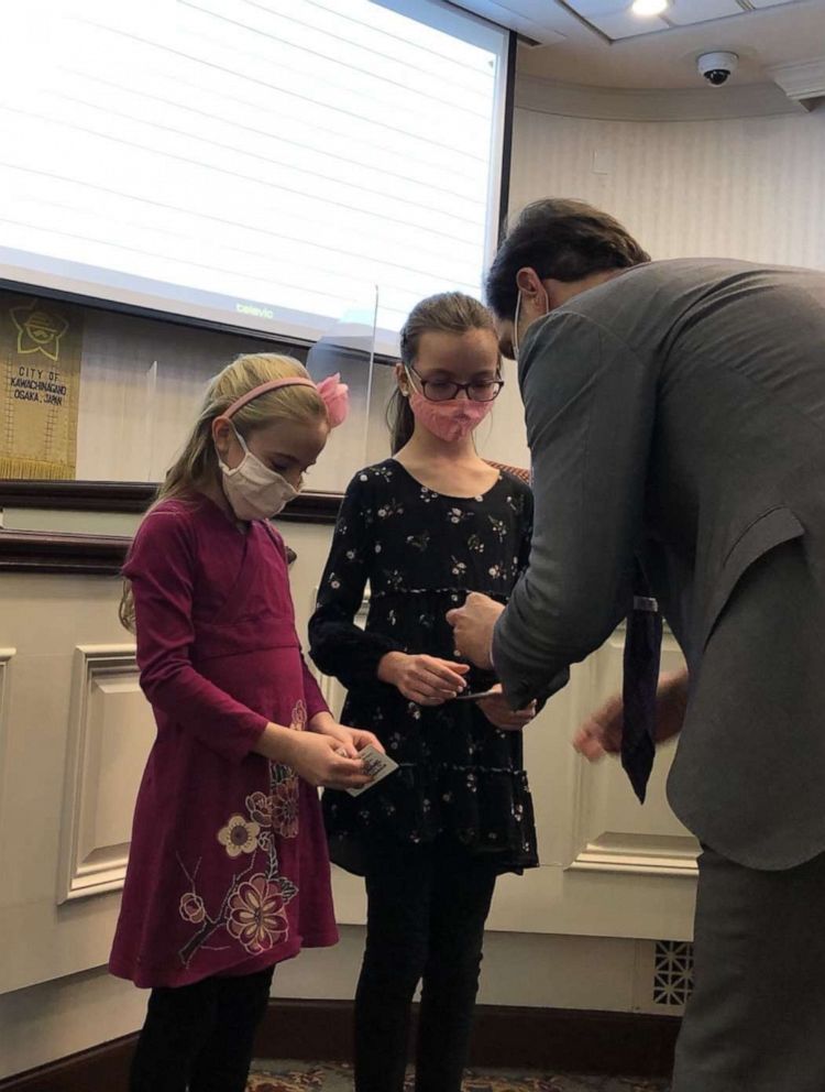 PHOTO: Blair Babione, 11, and Brienne Babione, 9, of Carmel, Indiana, wrote letters to Carmel City Council President Sue Finkam after spotting a "Men Working" sign being used in January in their community.