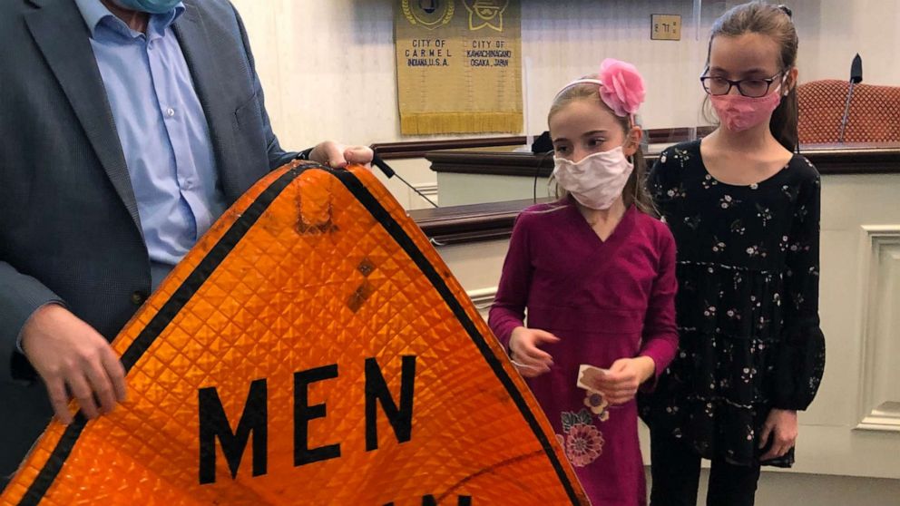 PHOTO: On March 1, the first day of Women's History Month, Blair and Brienne attended a City Hall council meeting in Carmel, Indiana, where they read their letters and received a "Men Working" sign that officials dug up from storage.