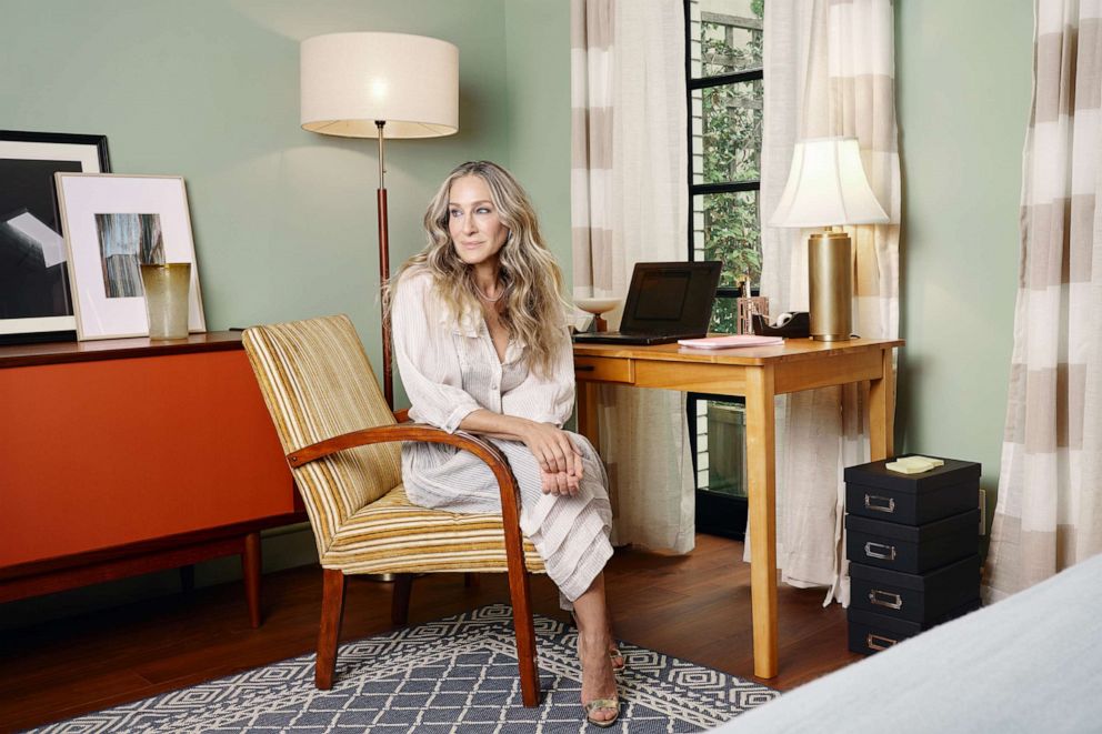 PHOTO: Sarah Jessica Parker sits inside a recreation of her iconic apartment from "Sex and the City.