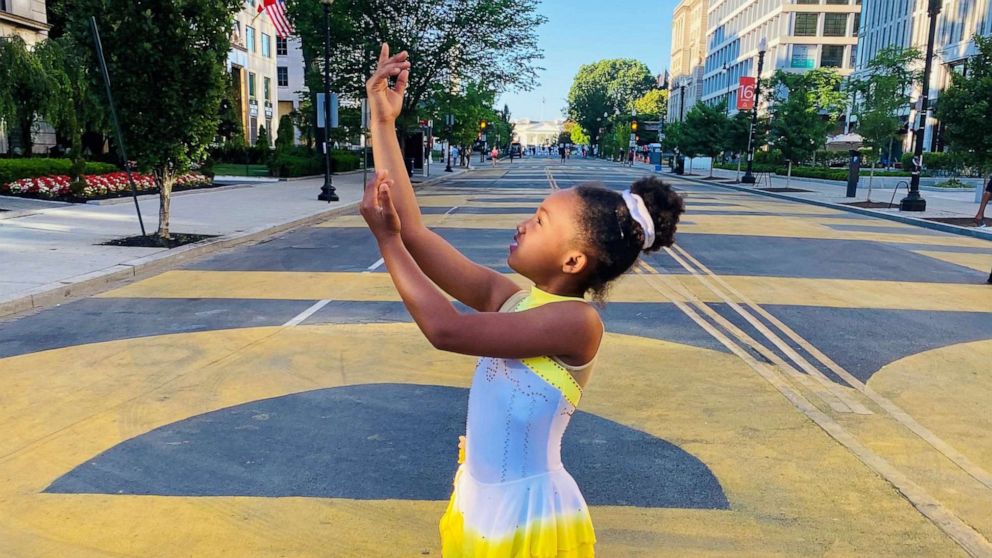PHOTO: Kaitlyn Saunders, 9, performed a skating routine at the Black Lives Matter Plaza in Washington, D.C.