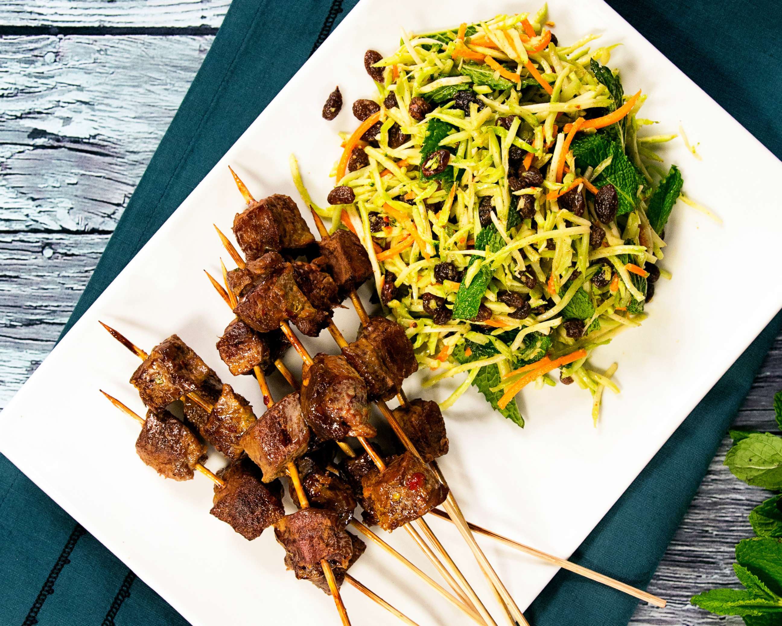 PHOTO: Daphne Oz shares her recipe for coconut beef skewers with broccoli slaw.