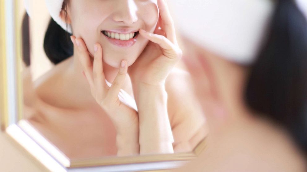 PHOTO: A woman looks in a mirror in this undated stock photo.