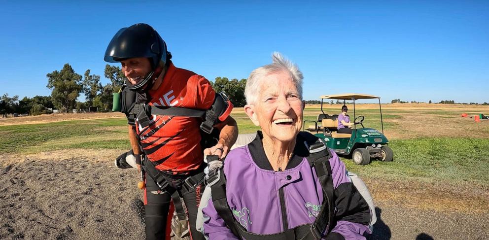 PHOTO: Tuter flashed a big grin after making her skydive landing.