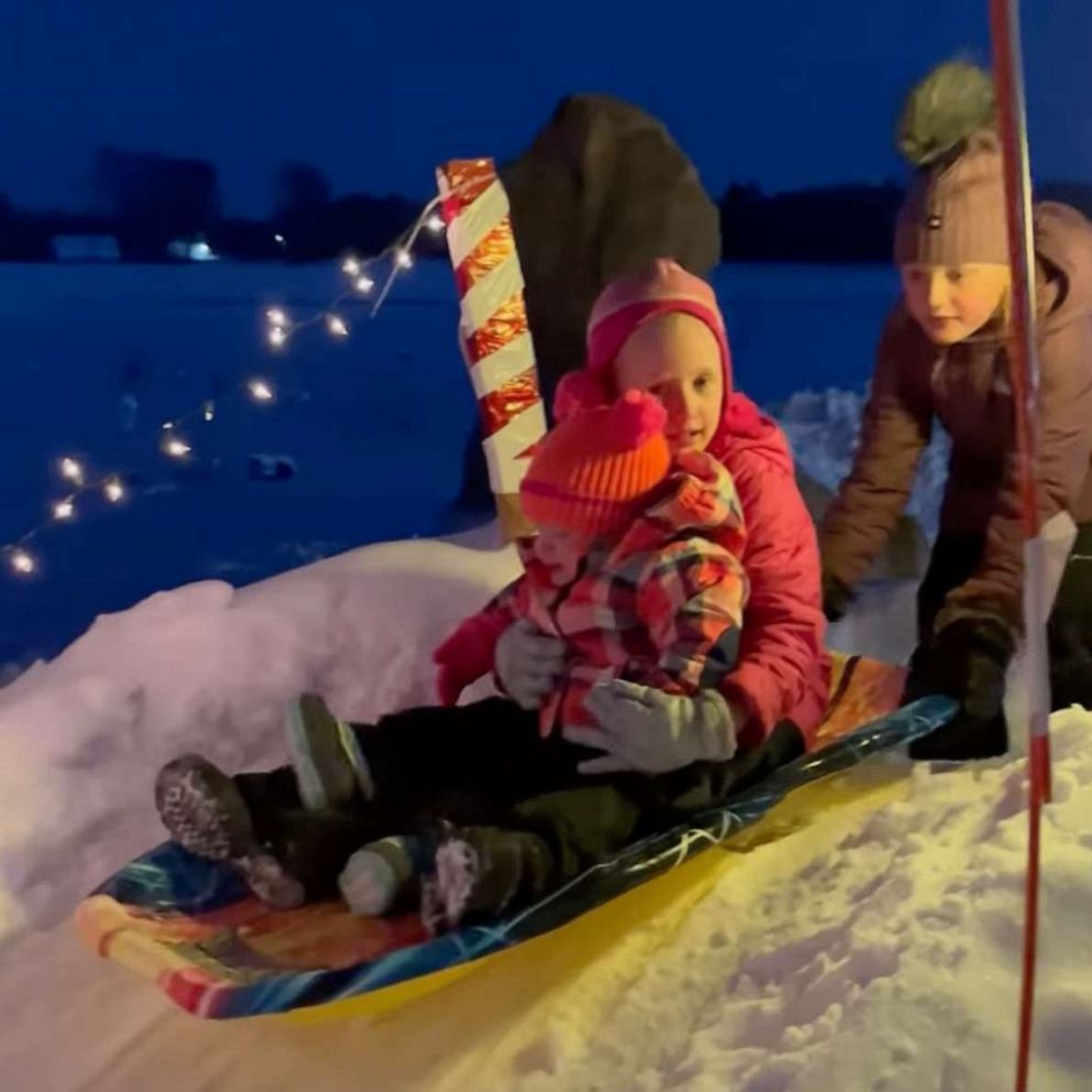 VIDEO: Grandpa builds elaborate sledding course for his grandkids