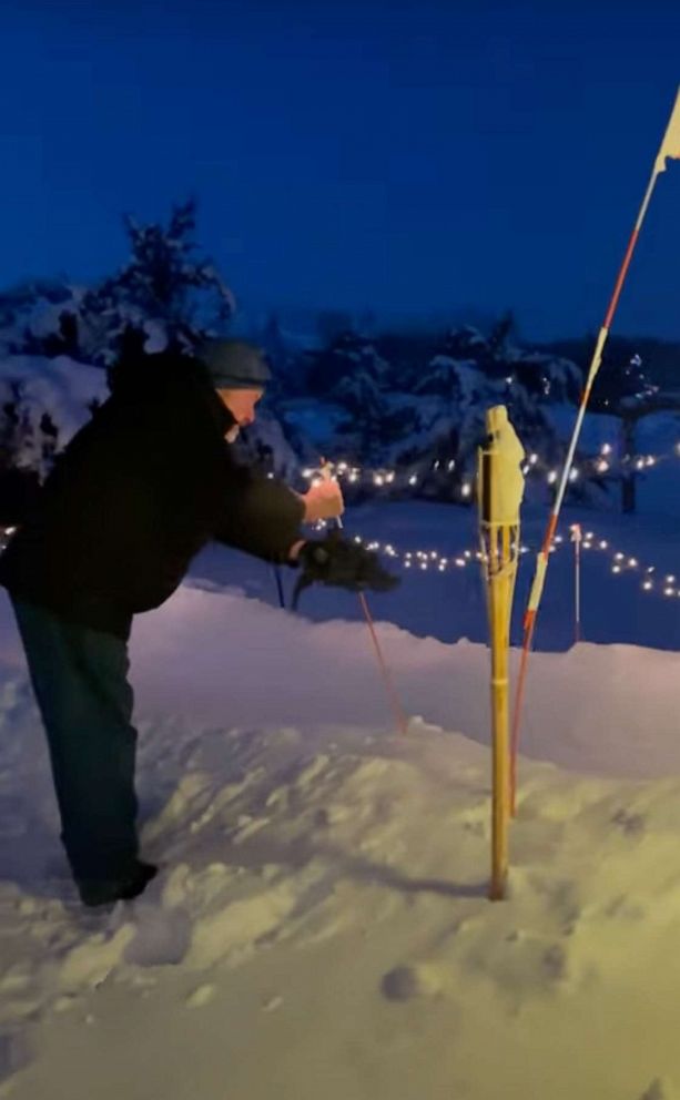 Grandfather builds 200-foot long backyard sledding course for his grandkids - ABC News