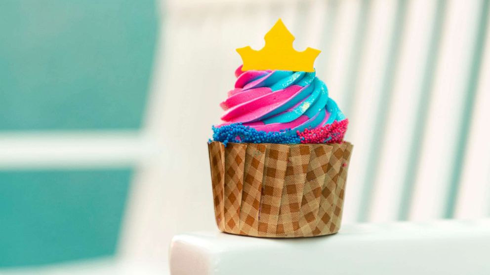 The Princess Aurora Cupcake, a vanilla cupcake with cotton candy buttercream,  is available until the end of February 2019 at the Intermission Food Court in Disney's All-Star Music Resort.