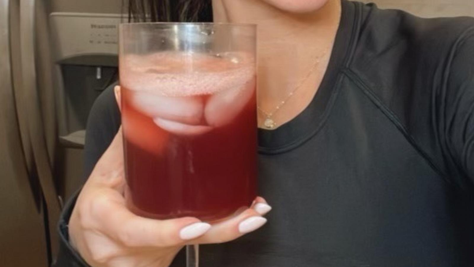 PHOTO: Gracie Norton holds a glass of her now-viral "sleepy girl mocktail."