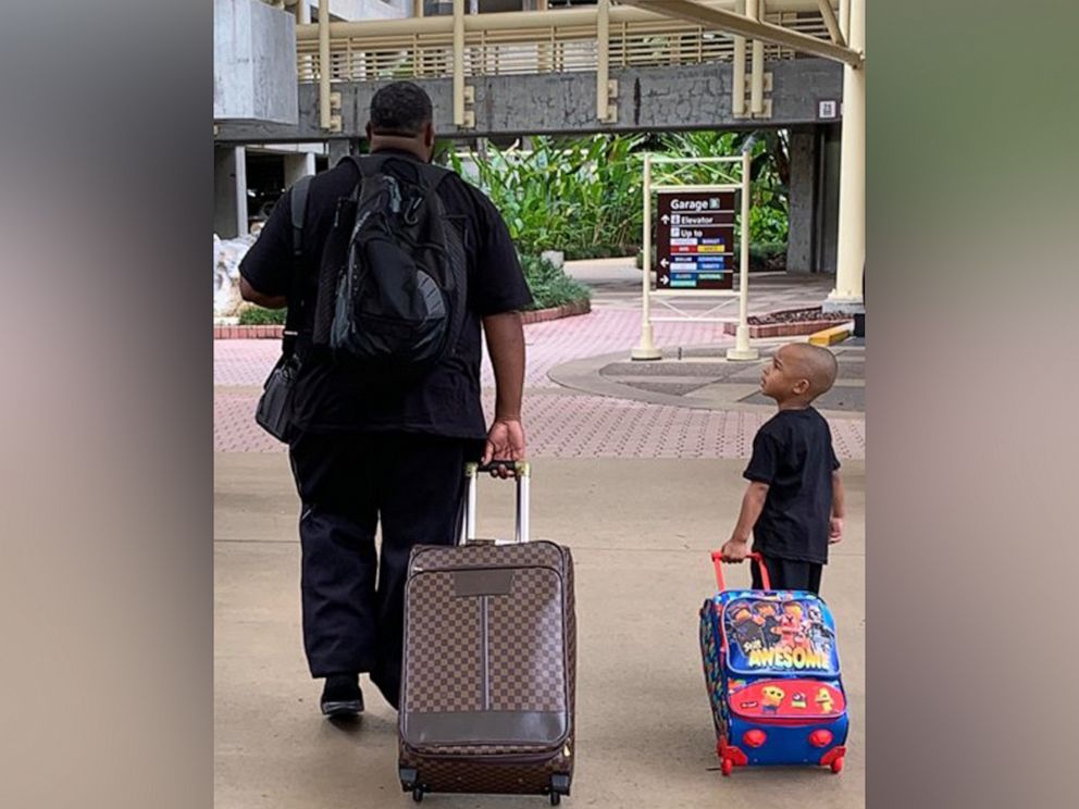 PHOTO: Rodney Small, 4, is seen walking with his dad, Darryl Small, as they embarked on a trip to Walt Disney World.